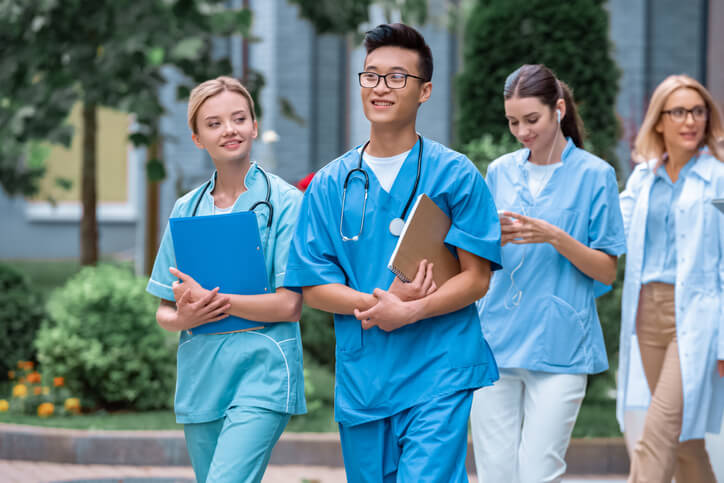 practical nurse training students walking to class