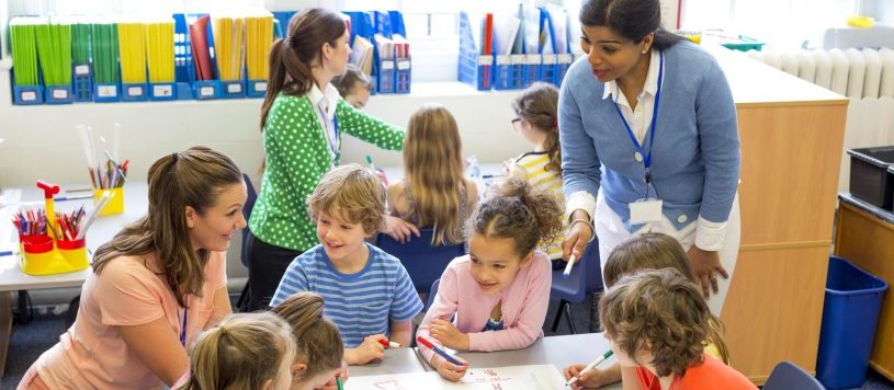 Education Assistants in a classroom setting.