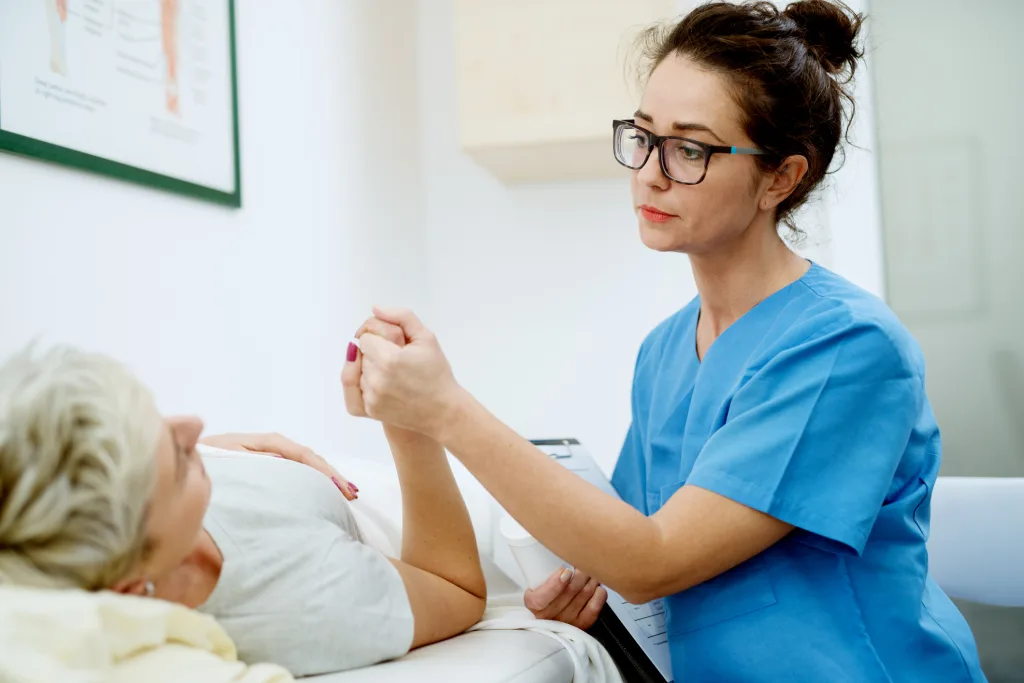 Health care assistant student practicing patient care skills