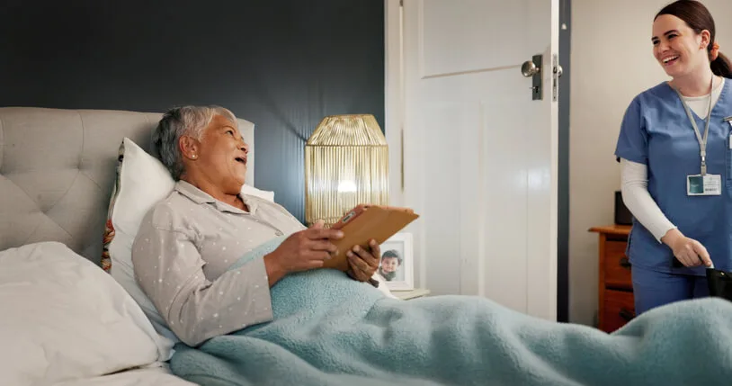 health care assistant working with a patient in a healthcare facility
