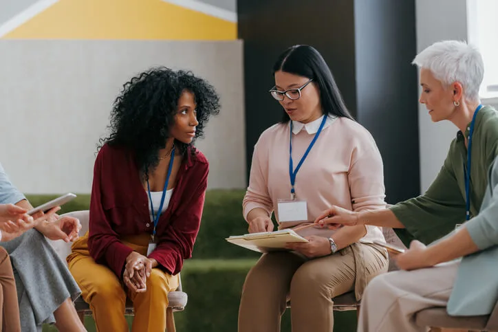 Mental health worker students practise communication and crisis intervention skills training.